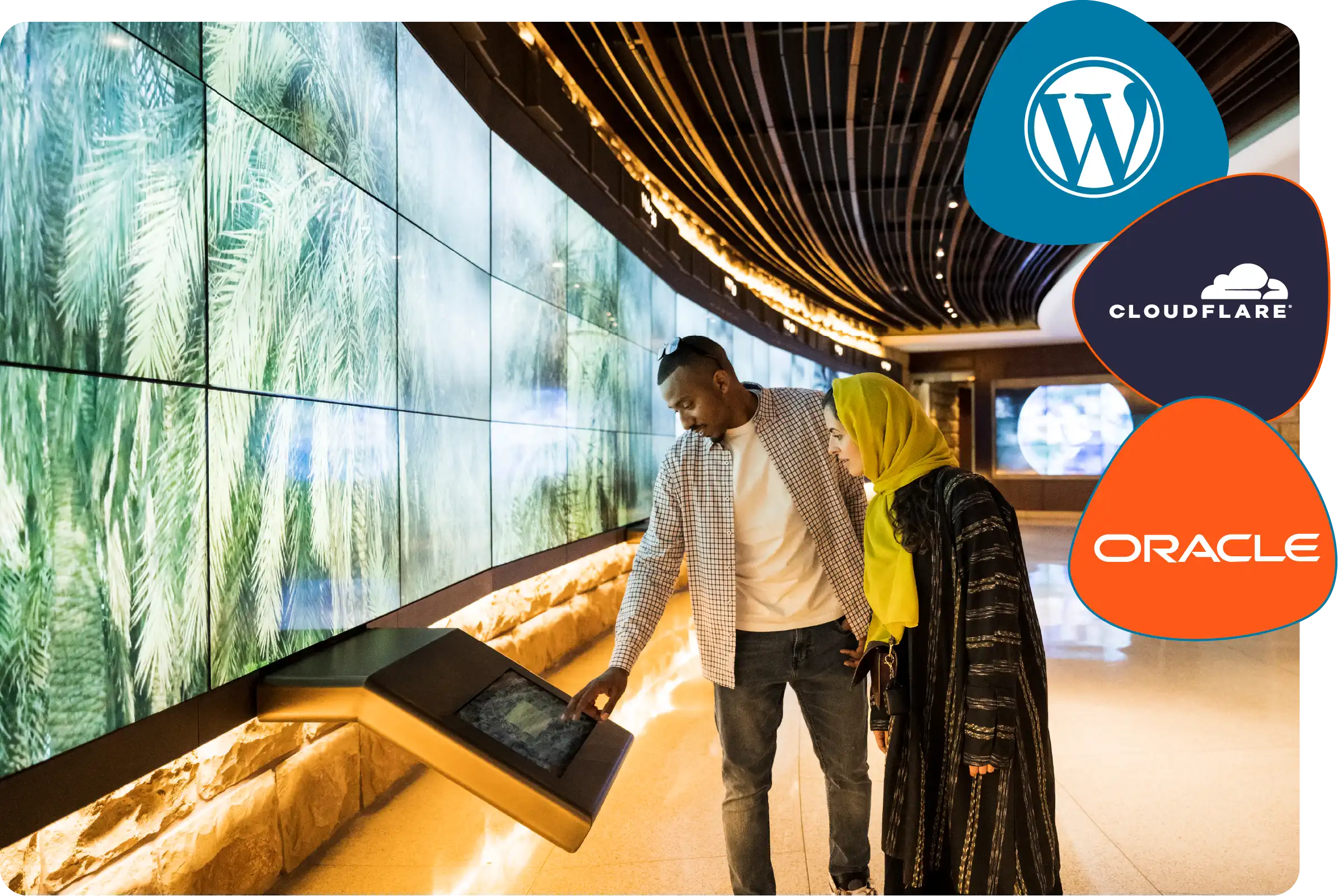 WordPress Enterprise Hosting 1 Wordpress Hosting Couple viewing large display screens