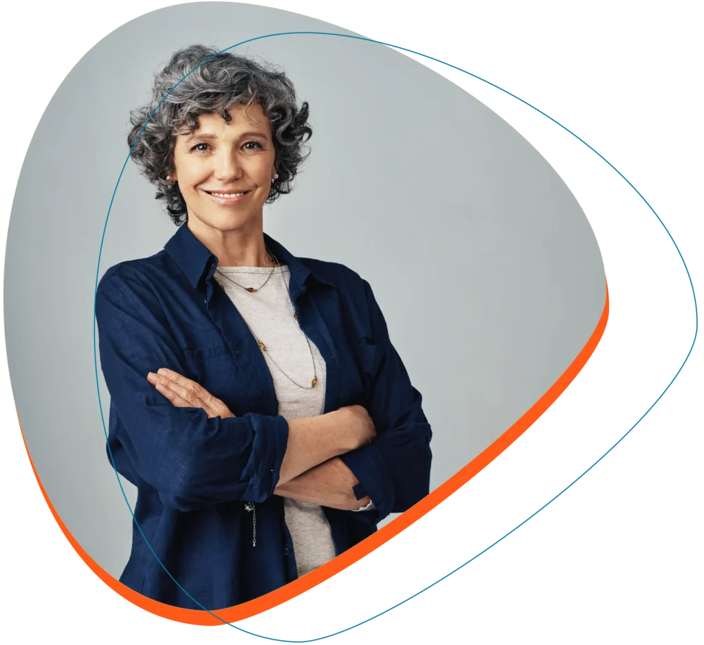 Why Happy Otter? 5 Woman smiling and looking at the camera with arms crossed