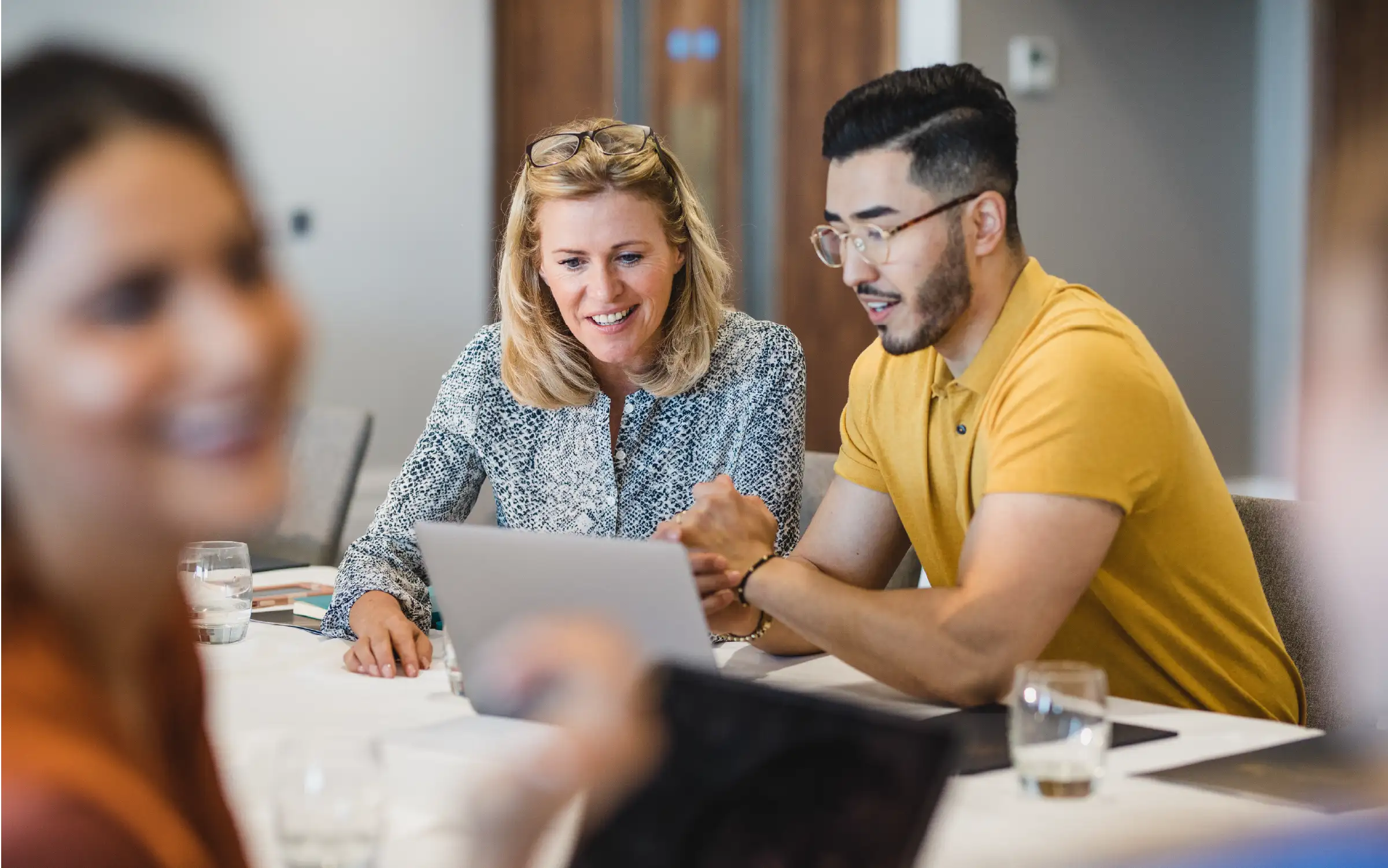 Professionals at a desk working on PPC Consultancy.
